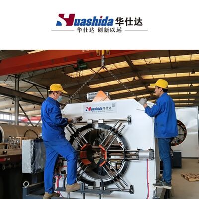 Automatic production line for vacuum-calibrated district heating pre-insulated pipes